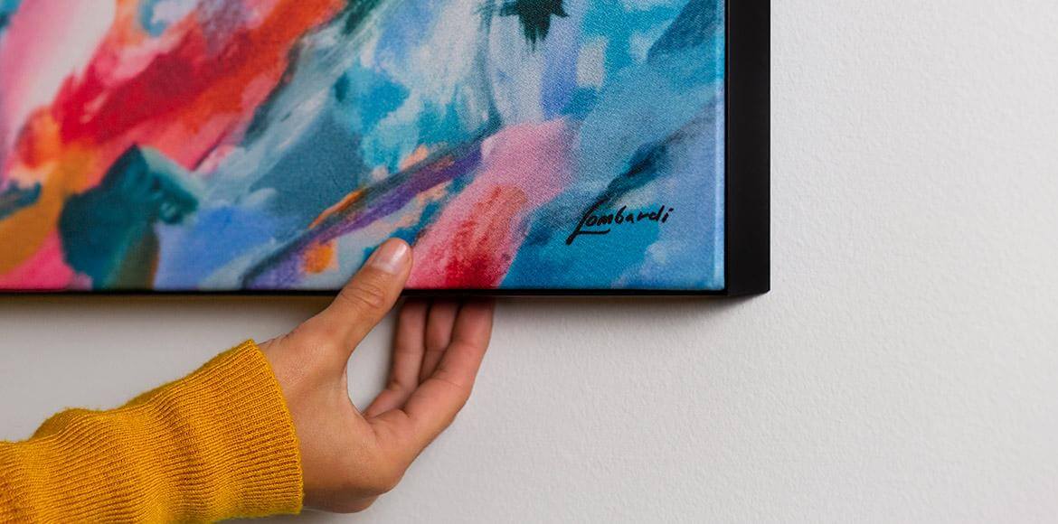 large painted wall art decor hanging on a wall