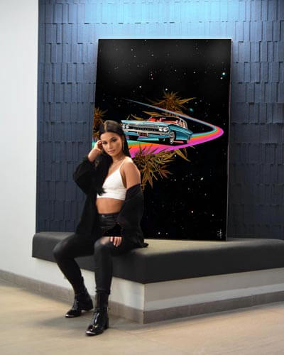 A model posing in front of a retro Classic Car wall art piece in space