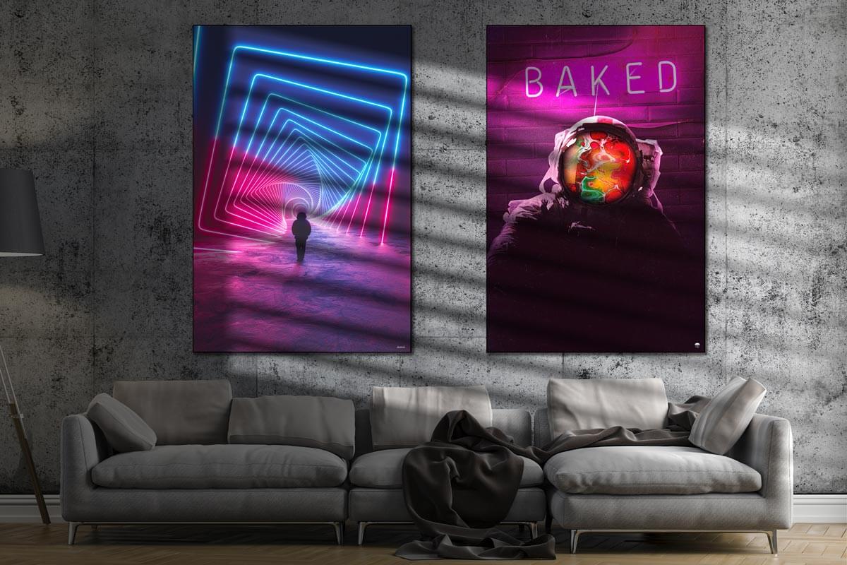 Two trippy wall art pieces over a couch