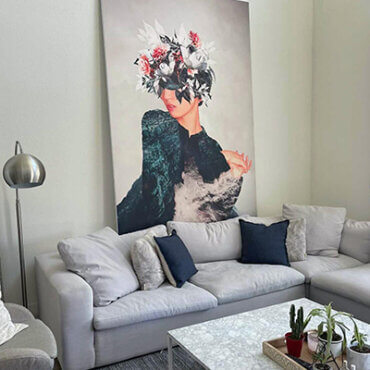 Large Floral Head Artwork Hung Up on Wall