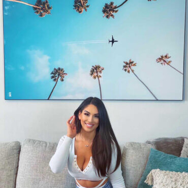 Oversized Palm Tree Artwork Hung on Wall