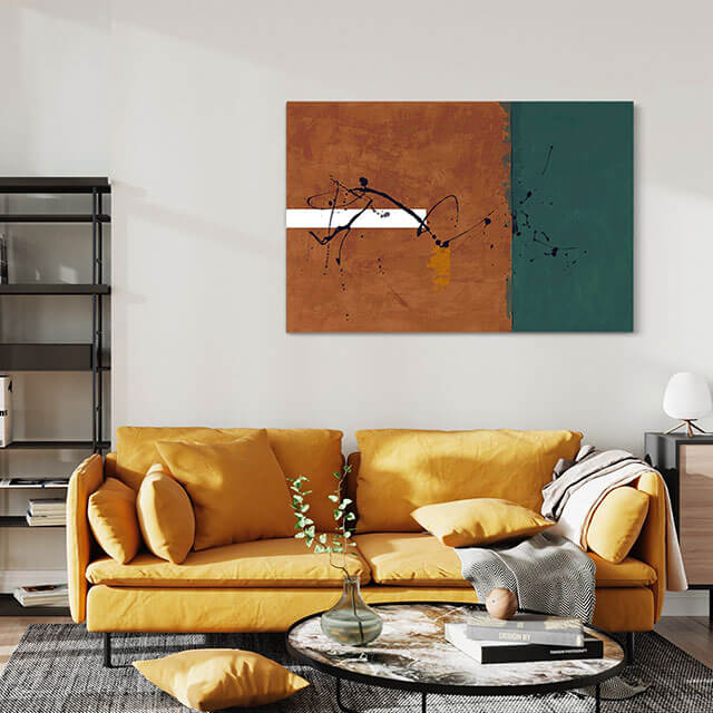 Brown and blue abstract art hangs above yellow couch in living room