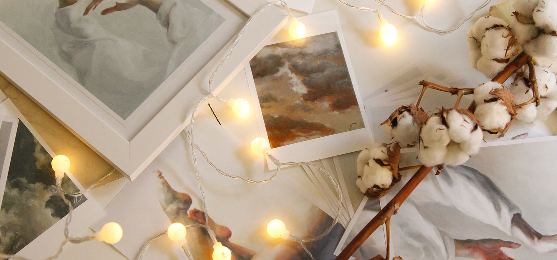 Pictures on the floor with twinkle string lights