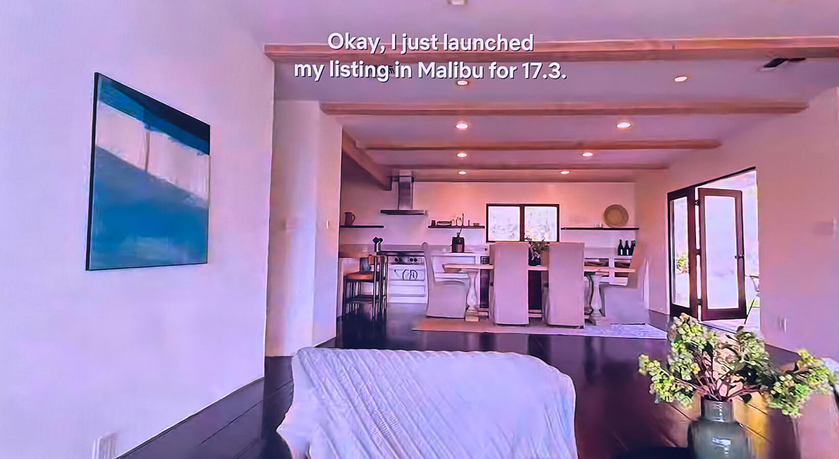 Square modern wall art in a minimalist luxury home interior.