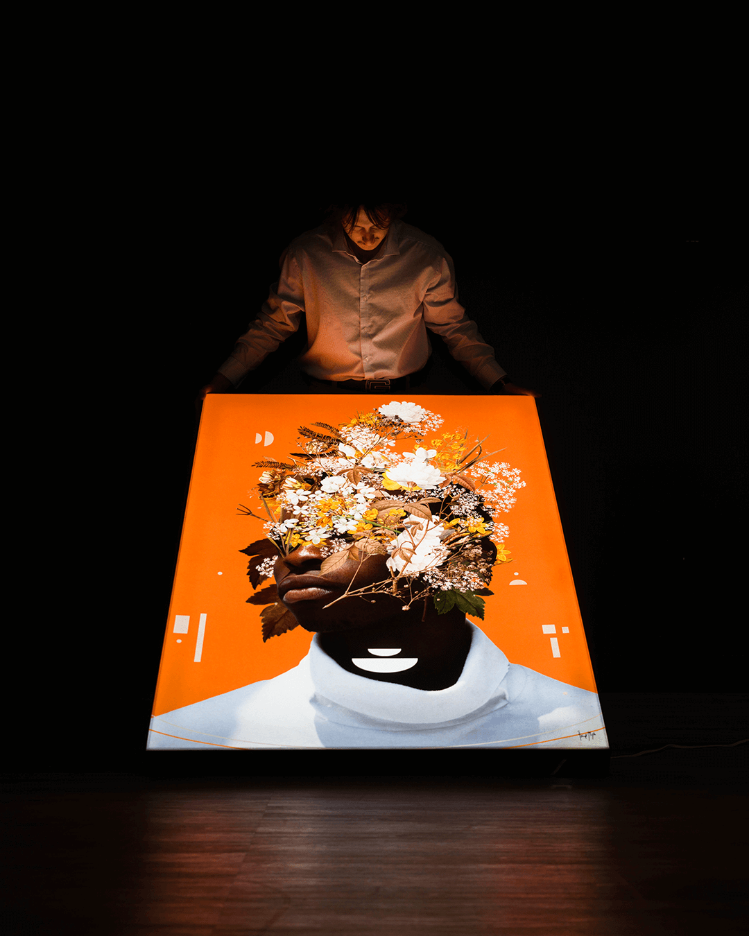 man with orange backlit surreal floral portrait art