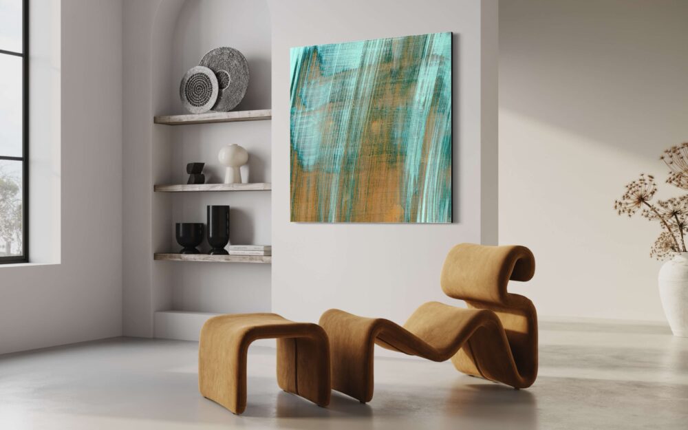 Large contemporary wall art in teal and copper like corroding copper hangs on white wall in living room above funk brown chaise lounge next to wall of open shelving.