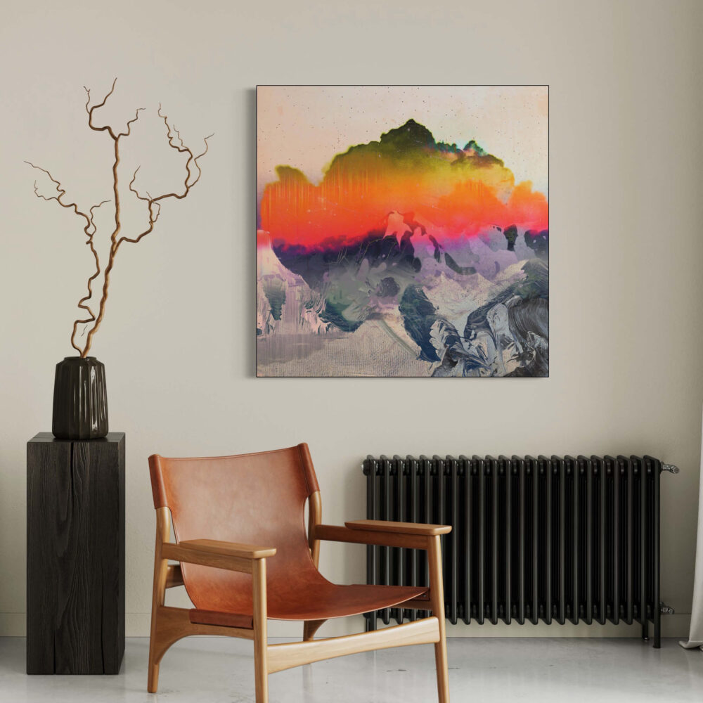 Large square abstract art of sunshine glow on mountain hangs in neutral living room