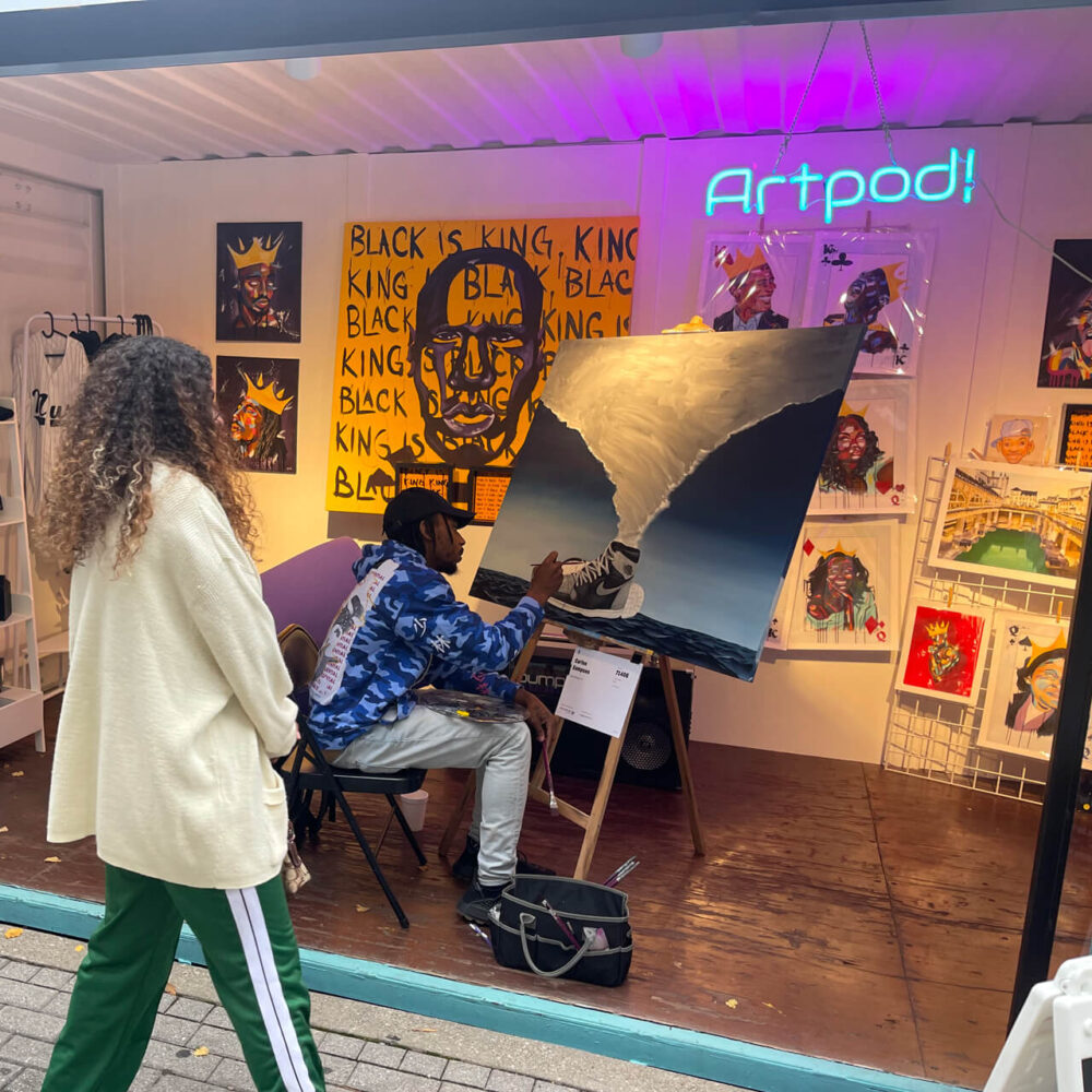 Artist Paints Surreal Sneaker Art Inside of Art Pod, Winner of Juried Time Based Award in ArtPrize 2022.