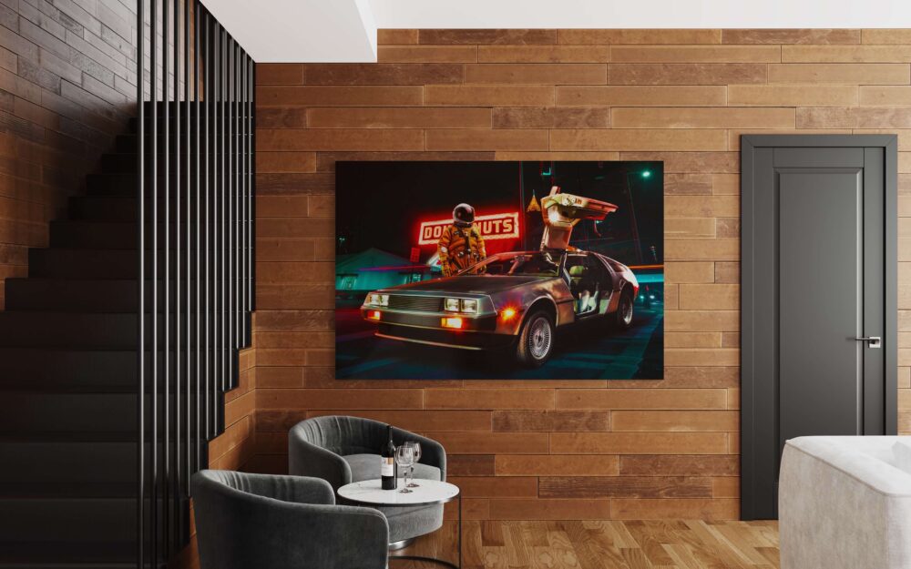 Oversized horizontal surreal wall art featuring an astronaut standing behind retro car hangs on wood paneled wall