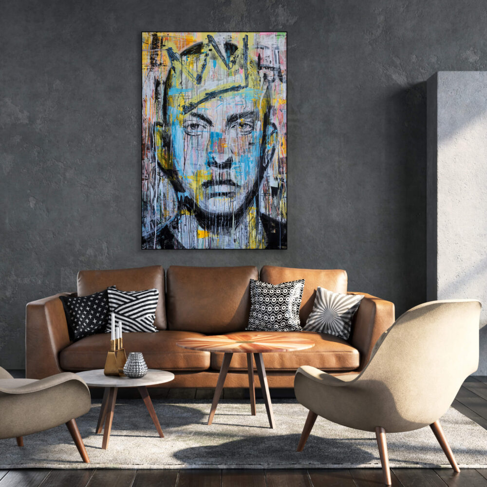 Oversized colorful pop art of Rapper Eminem hangs on cement wall in living room