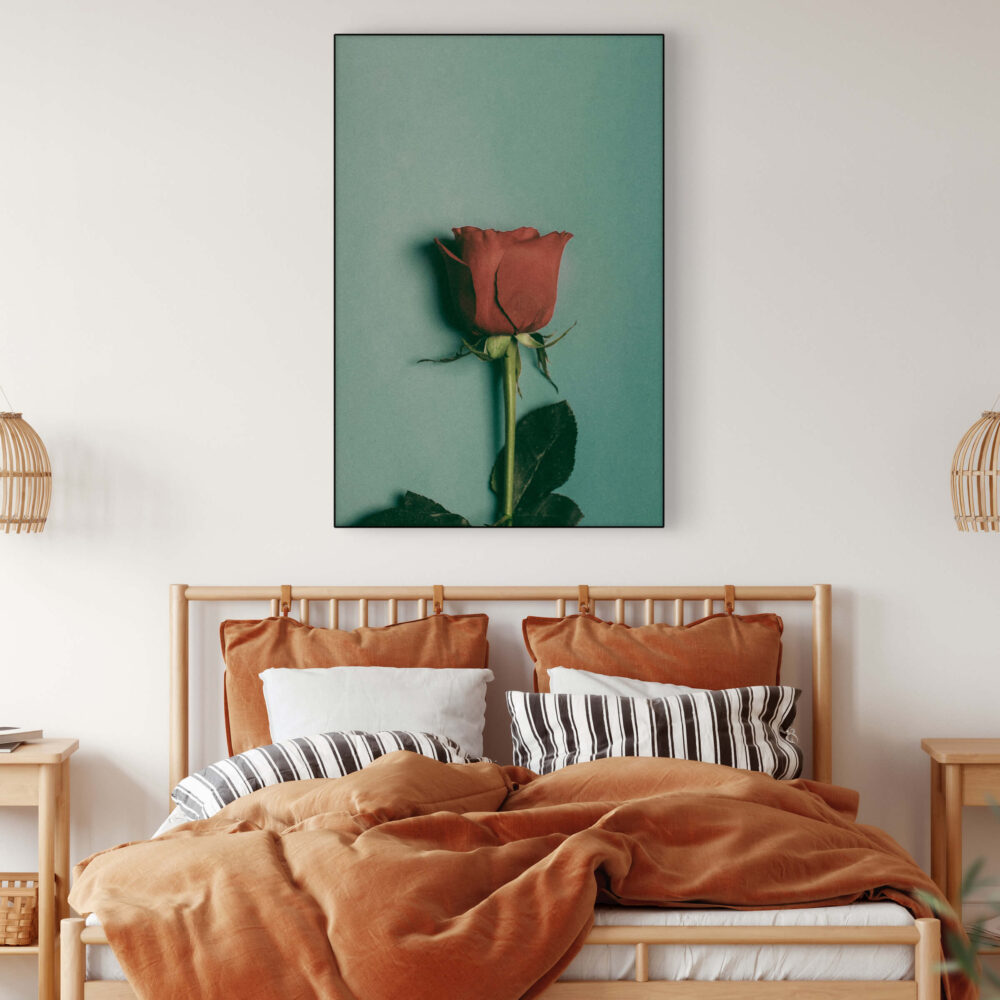 Oversized blue boho wall art of vintage rose hanging in bedroom
