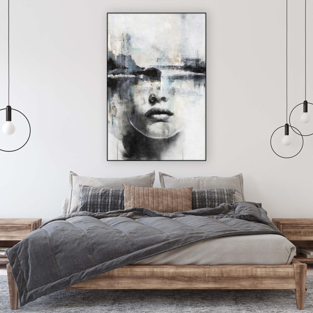 Oversized vertical abstract wall art with lips hangs above bed