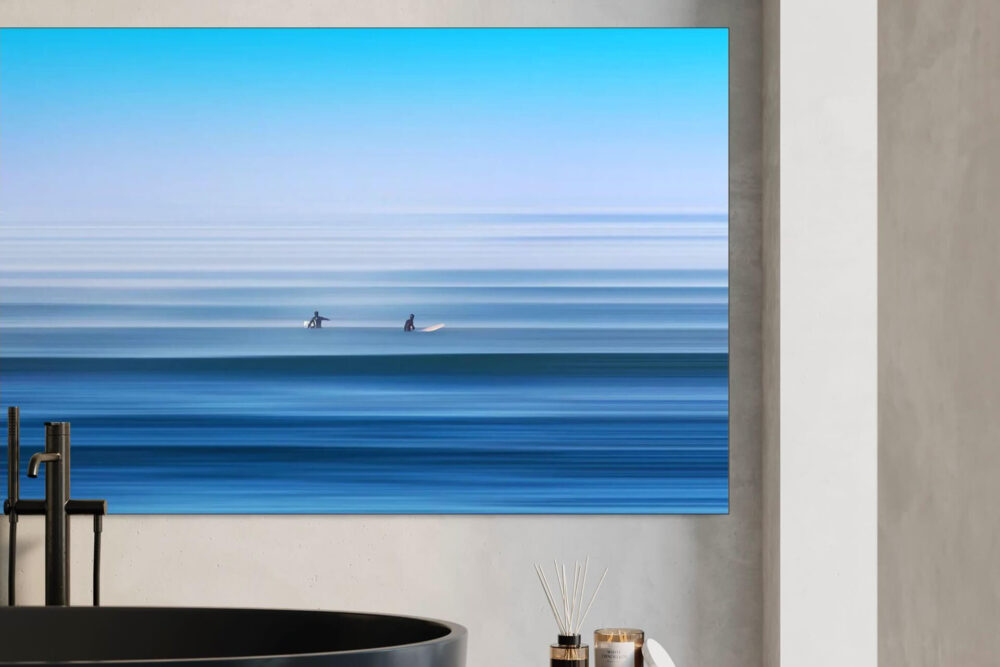 Zen surfing wall art hangs in contemporary bathroom giving relaxed, natural feel.