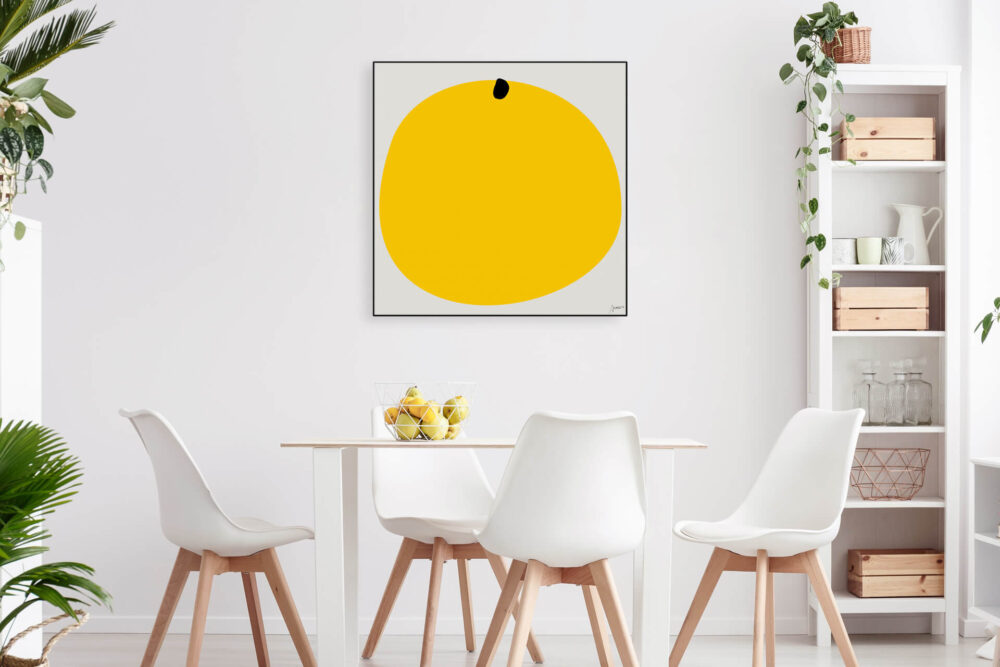 Oversized yellow boho art hanging in neutral boho apartment