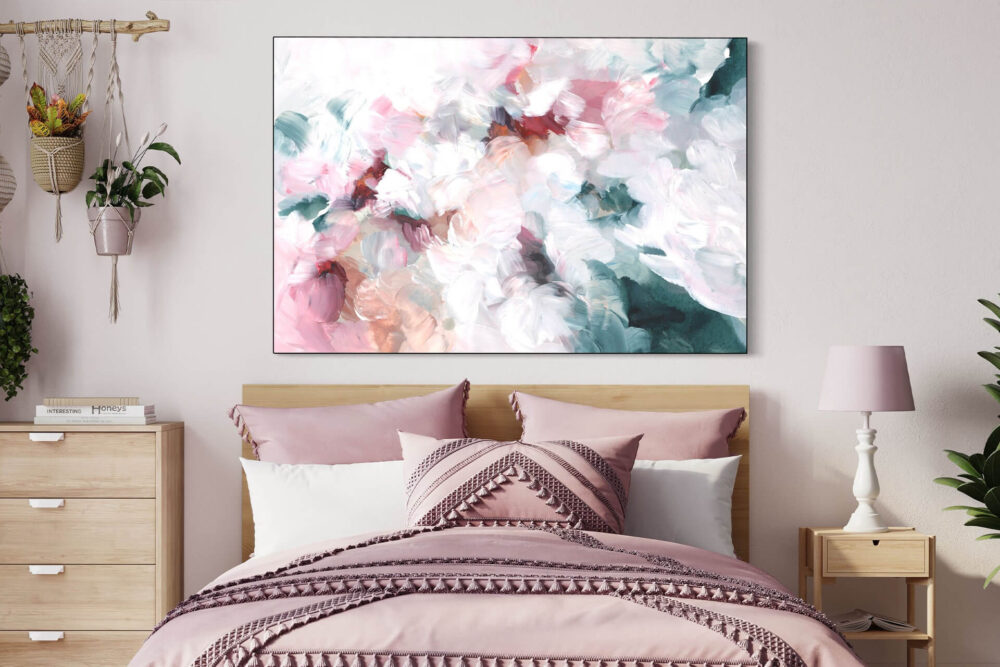 Bring a soft yet powerful strength to your girls room with large abstract painting in white, pink, and blue hanging above the bed.