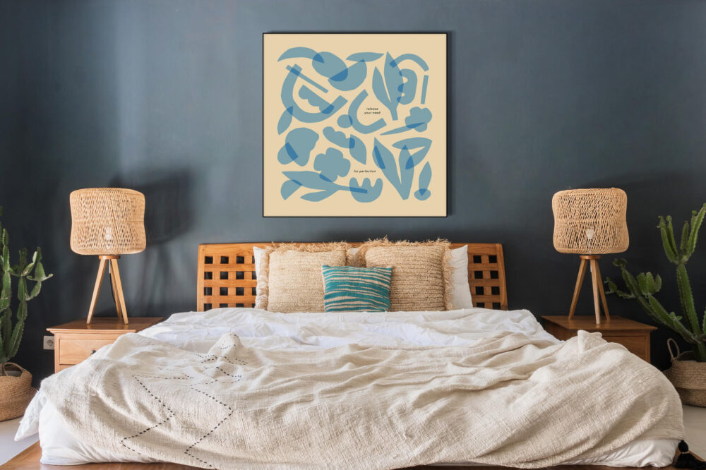 Massive light blue minimal wall art featuring layers of geometric shapes and flowers hangs on whitewashed brick wall above boho bed.