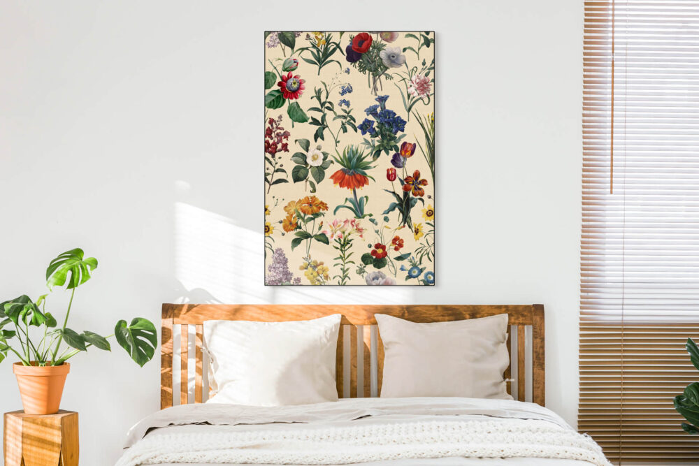 Oversized neutral flower boho print hangs above bed in boho bedroom