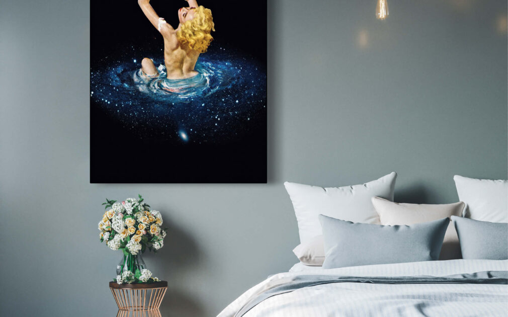 Extra large bedroom wall décor of woman bathing in tub of galaxy and stars hangs on blue wall in bedroom