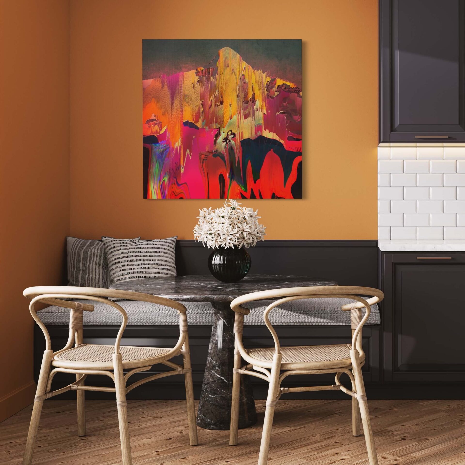 Large digitally painted abstract wall art in warm colors hangs above table in eat-in kitchen