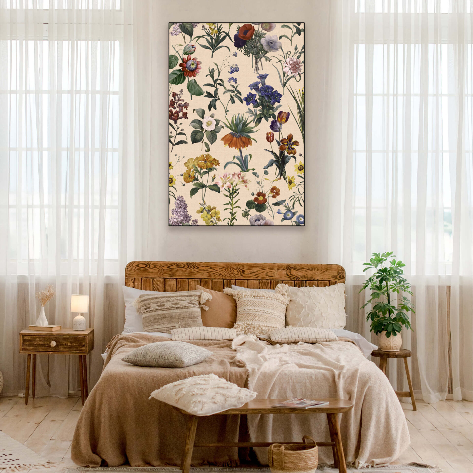Oversized neutral flower boho print hangs above bed in vintage boho bedroom