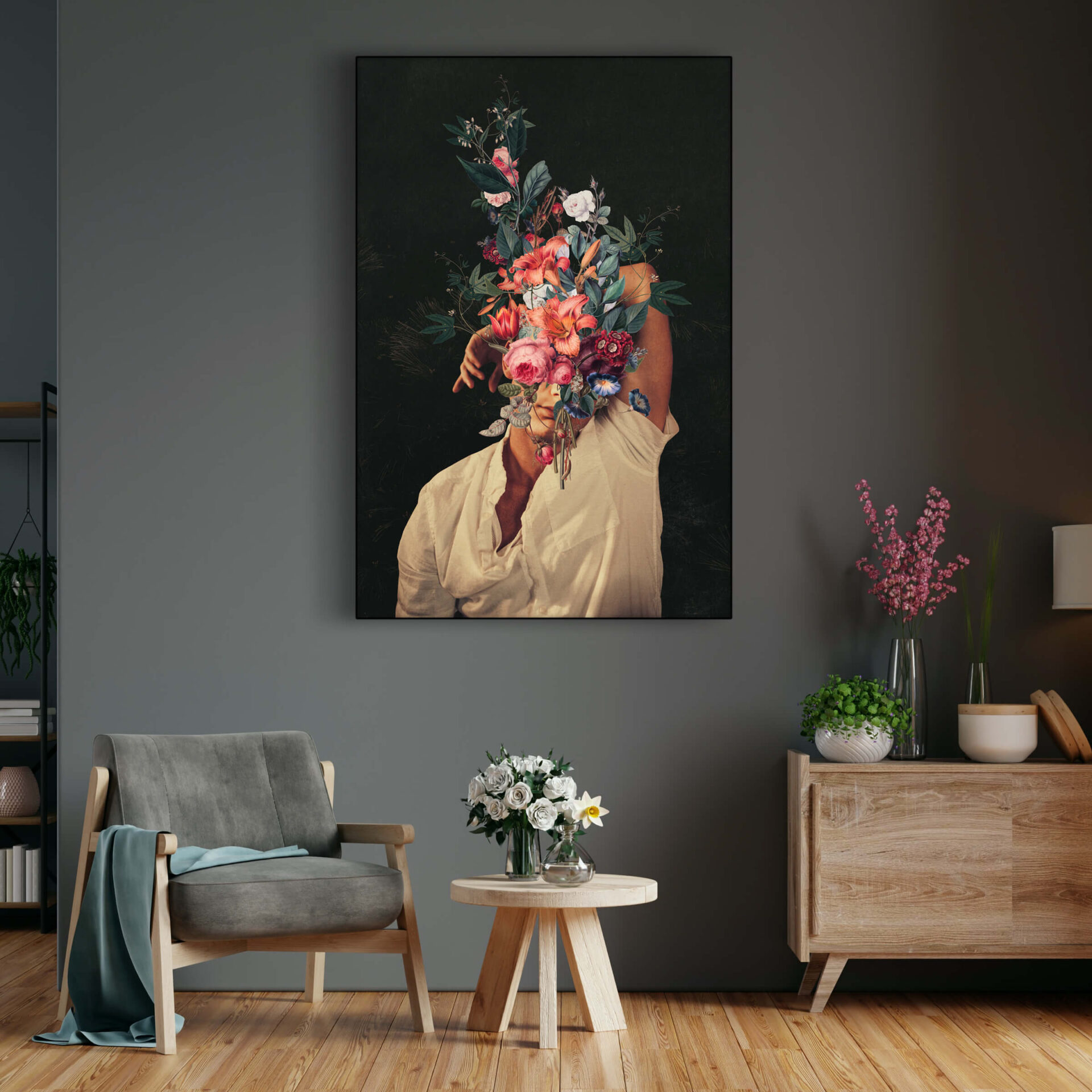 Massive trending painting of someone's profile where their head is covered in large floral bouquet on a black background hangs in living room.