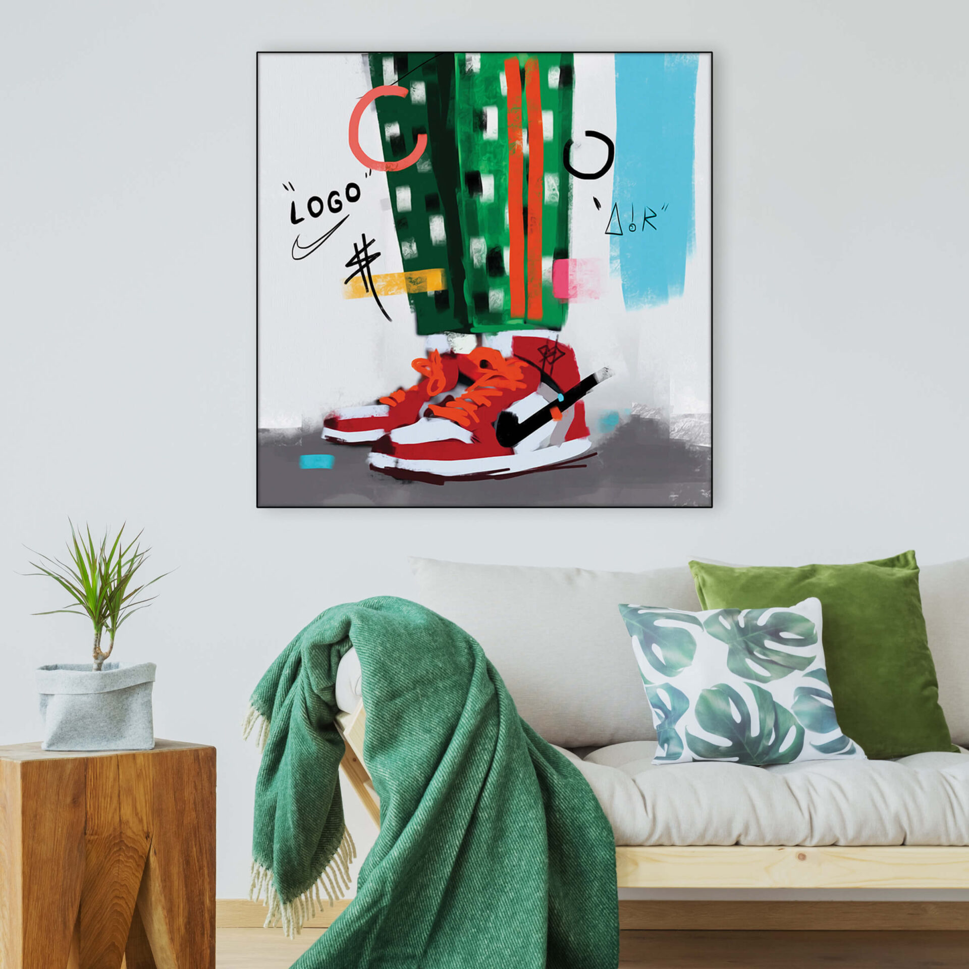 Nike Air Sneaker Wall Art in green, blue, and red hangs on wall above couch in living room