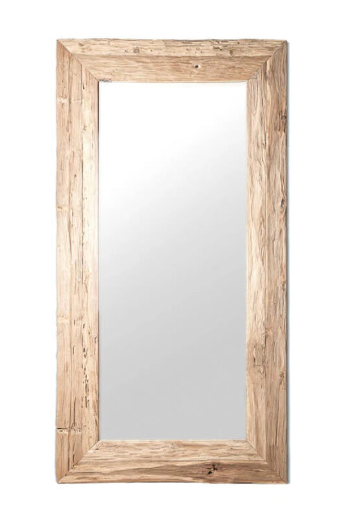 Tall mirror with a reclaimed wood frame—adds rustic texture and warmth to coastal decor.