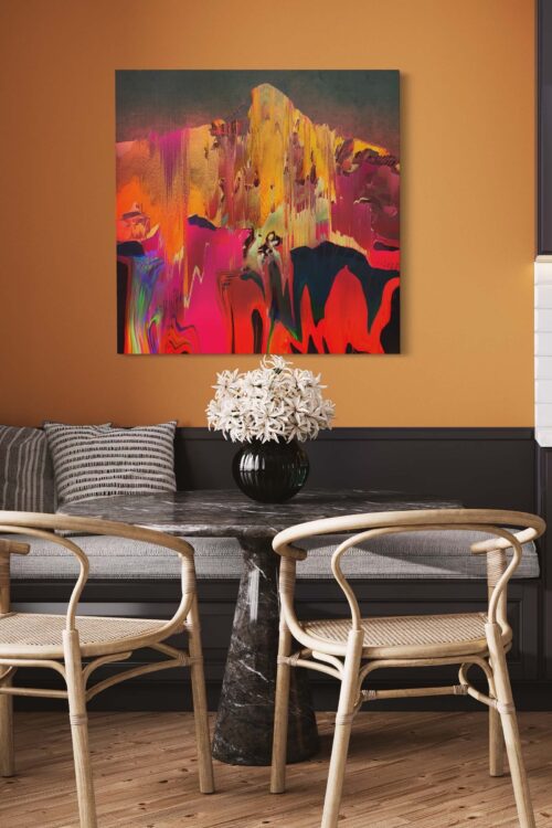 Large digitally painted abstract wall art in warm colors hangs above table in eat-in kitchen