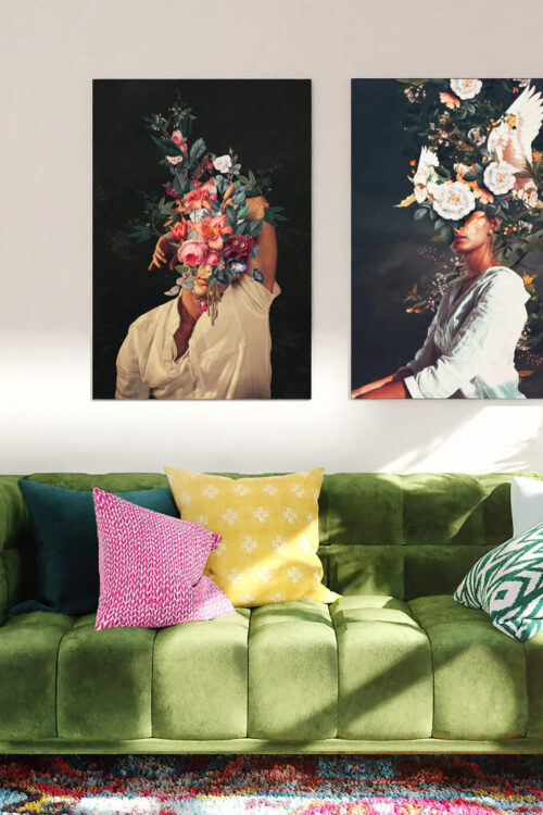 Two Frank Moth Floral Head Large Wall Art Pieces Hang Side by Side Above Green Couch in Living Room