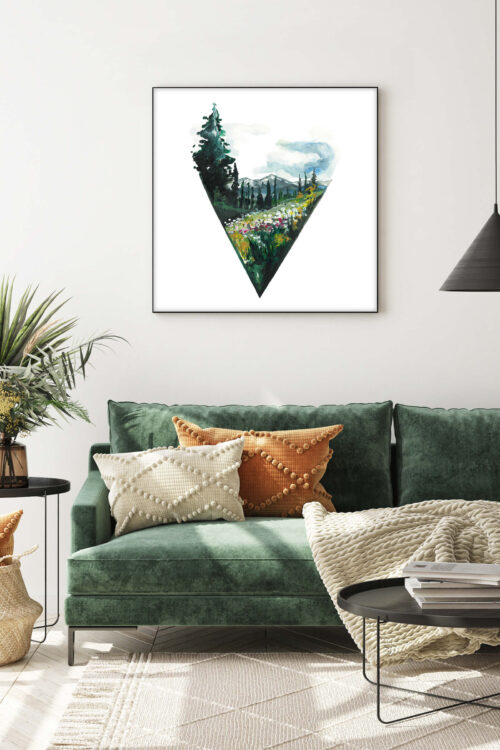 Square painting of mountain meadow in dark greens hangs on white wall above dark green couch in modern living room.