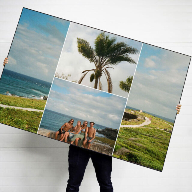 Large custom collage art print featuring 4 beach pictures from vacation is held by person.