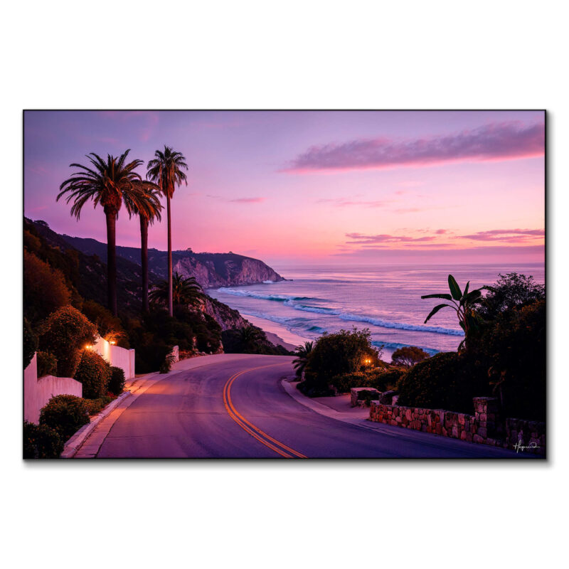 Scenic coastal road at sunset with palm trees, rugged cliffs, and a pink and purple sky.