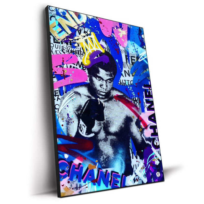 Muhammad Ali spray paint art with colorful graffiti and luxury brand names in the background.