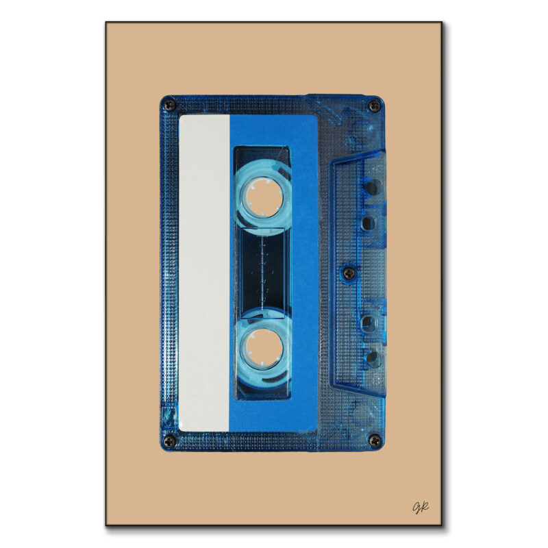 Retro blue audio cassette tape with a white and blue label against a tan background.