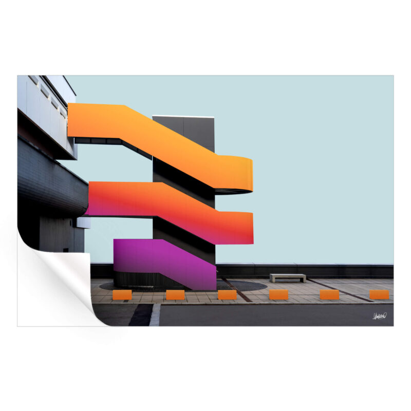 Bold modern staircase with vibrant orange and pink hues, set against a dark building background, featuring dynamic design.