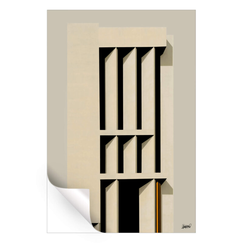Minimalist building with vertical lines and dramatic shadows in beige.