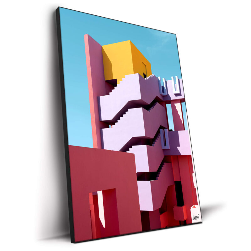 Pastel architecture with zigzag stairs and yellow, pink, and purple blocks against a blue sky.