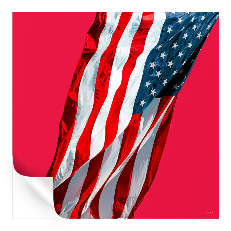 American flag displayed against a bold red background, creating a striking visual impact.