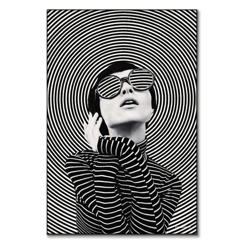A woman in sunglasses poses in front of concentric black and white circles, creating a dynamic and fashionable artwork.