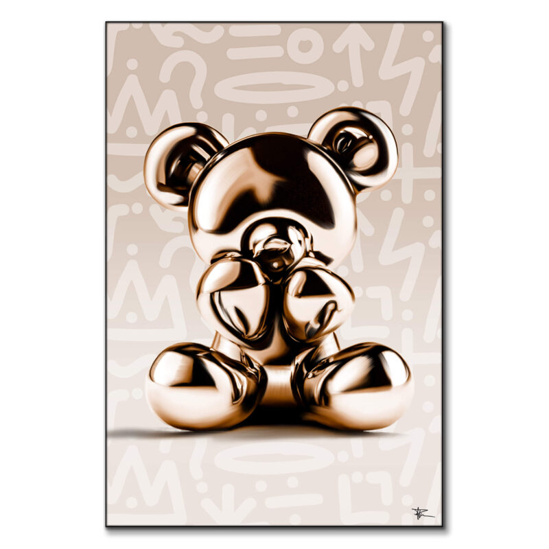 Gold metallic bear sculpture on a graffiti-inspired cream background with abstract patterns.