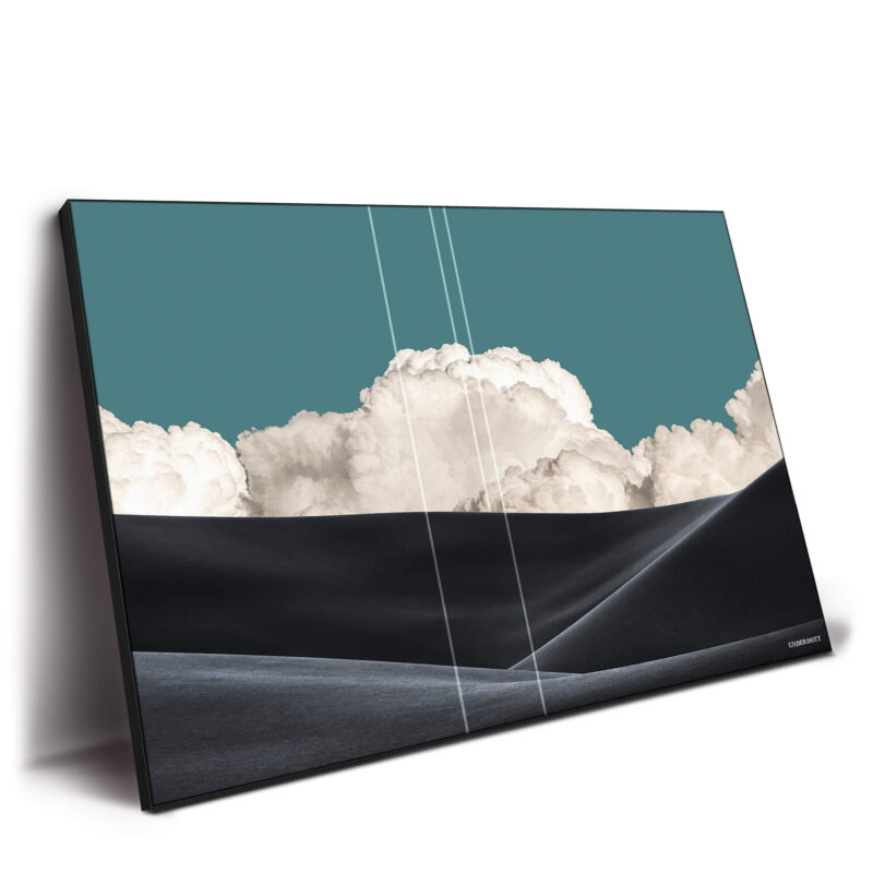 Surreal landscape with black sand dunes and dramatic clouds against a teal sky.