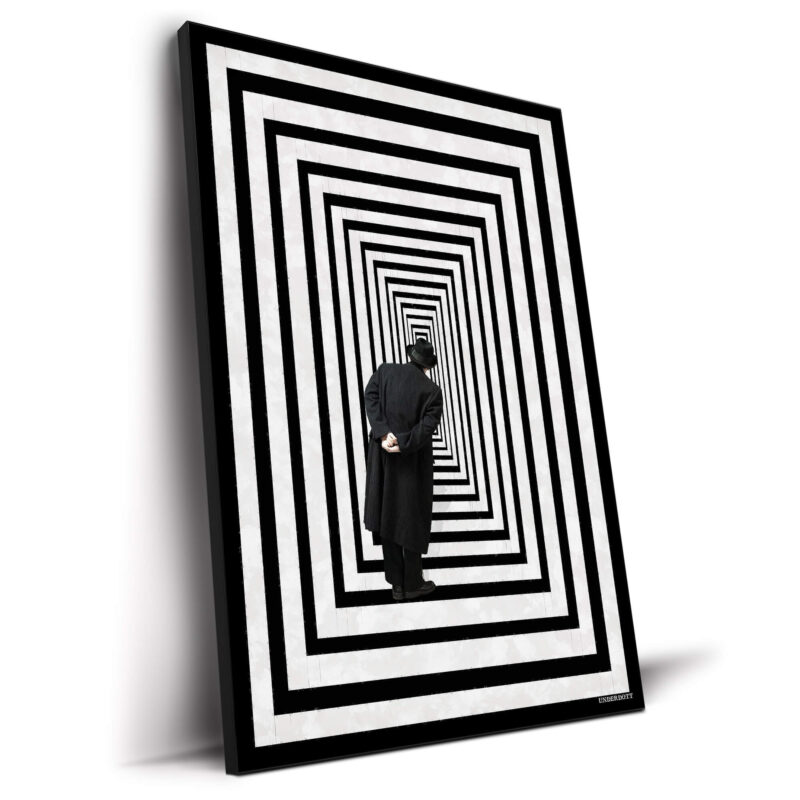 A man standing in an optical illusion hallway with black and white concentric stripes, creating a sense of infinite space.