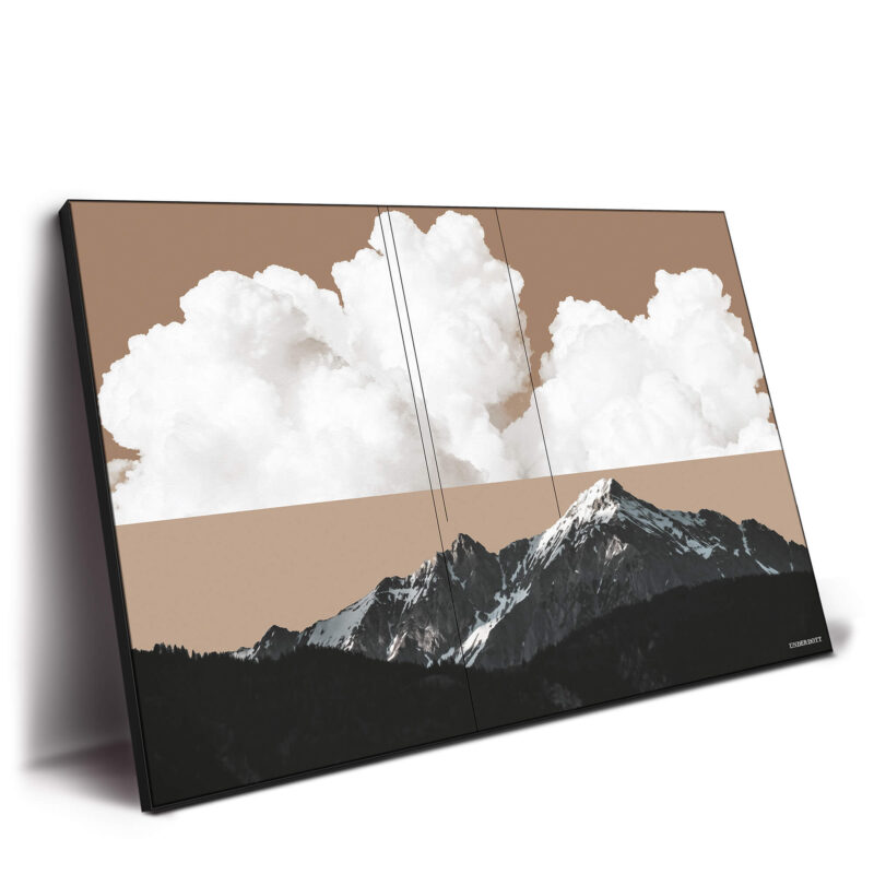 Mountain landscape with a soft tan sky, white clouds, and dark forested peaks, creating a peaceful yet dramatic natural scene.